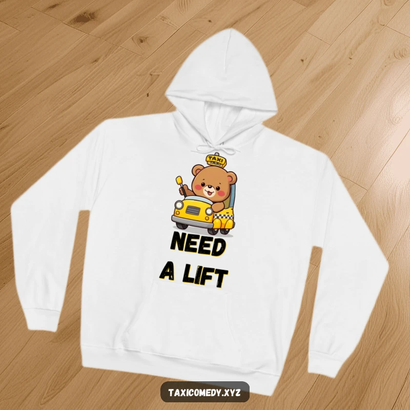 A jolly bear flagging down a whimsical taxi, designed for comfort on a soft hoodie.