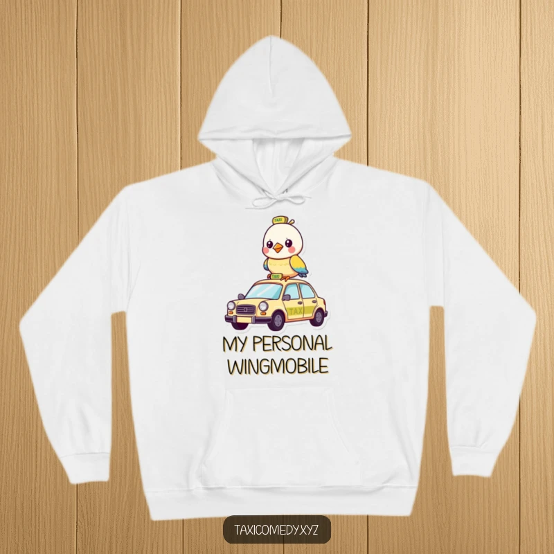 Funny hoodie depicting a cheerful bird humorously situated atop a classic yellow New York City taxi.