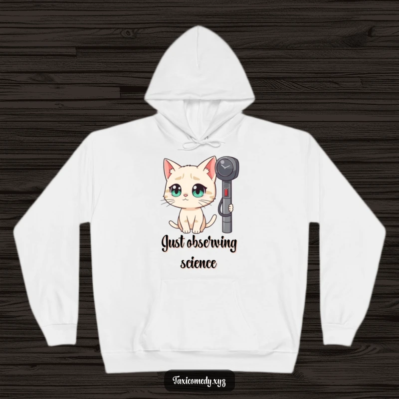 Funny hoodie showing a cat with huge eyes fixated on a taxi meter, capturing a moment of hilarious curiosity.