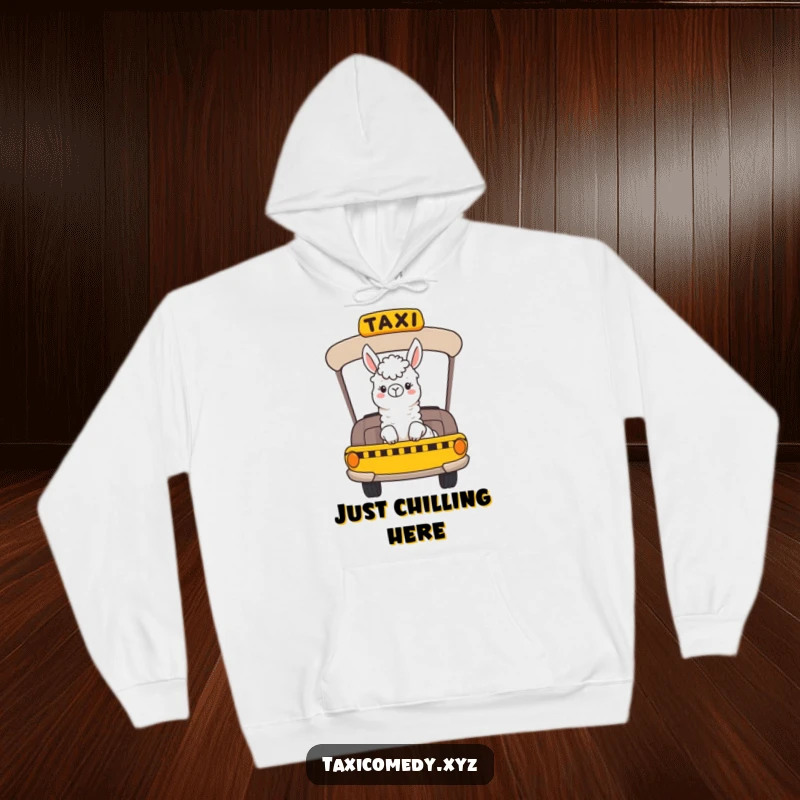 Funny hoodie featuring a cheerful llama riding in the back of a taxi, looking out the window with a happy and relaxed demeanor.