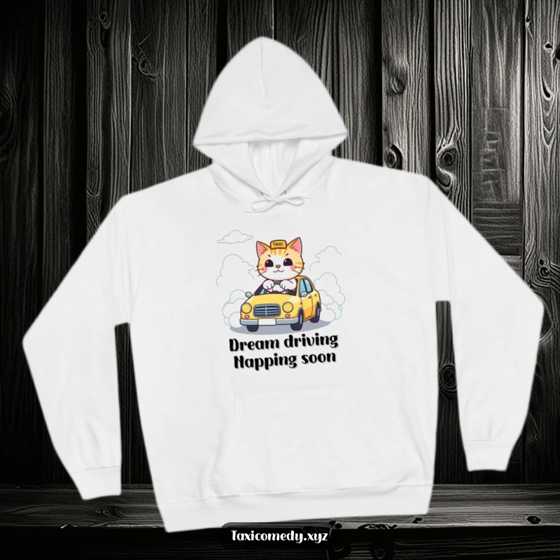 Funny hoodie featuring a cat steering a taxi down a road made of clouds, offering warmth and humorous, dreamlike style.