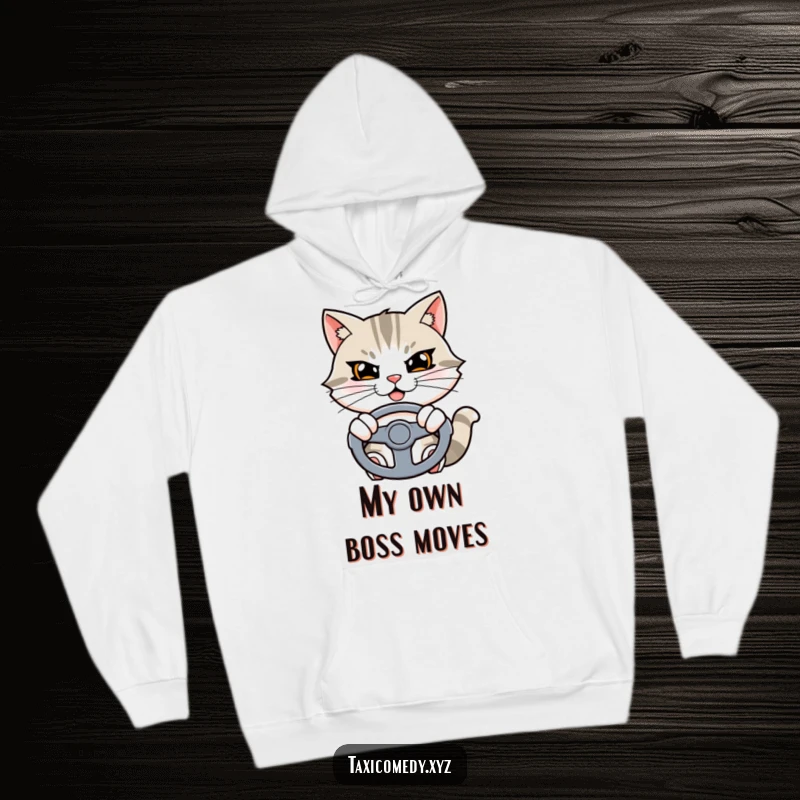 Funny cat hoodie showing a determined cat character with a smirk, holding onto a steering wheel.